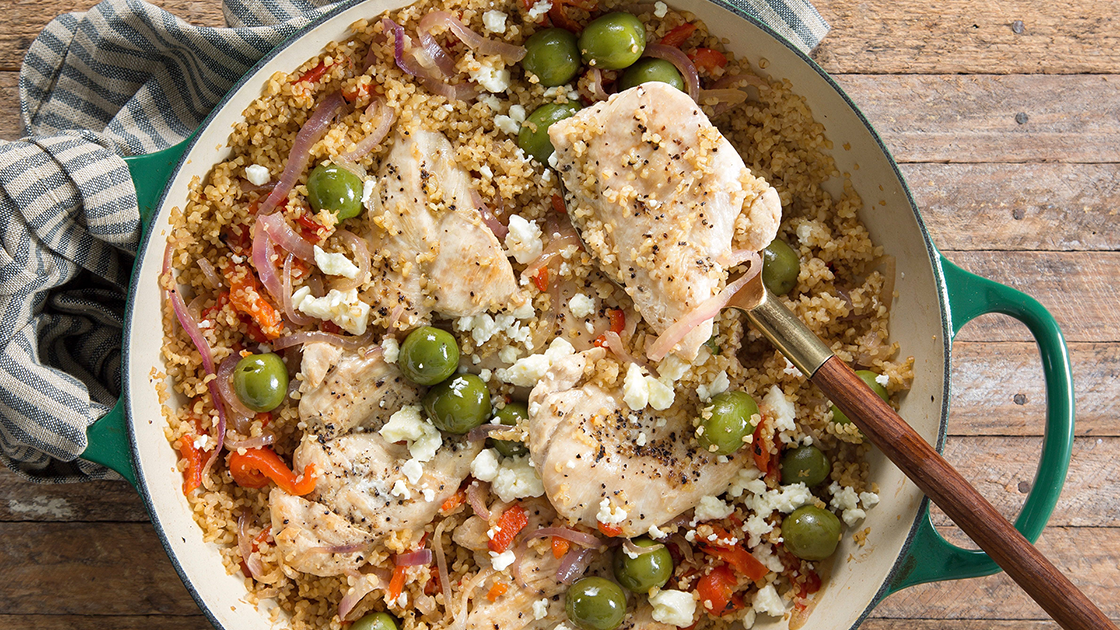 Mediterranean chicken with bulgur in a skillet