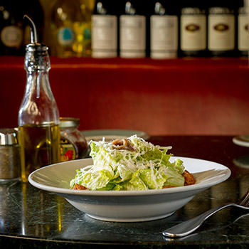Caesar salad in a bowl.